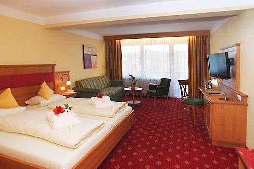 Doppelzimmer Sonnenschein mit Zusatzbett Geräumige Zimmer für 2-3 Personen im Ferienhotel